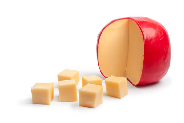 Dutch Edam cheese cubes Dutch Edam cheese cubes on white background edam stock pictures, royalty-free photos & images