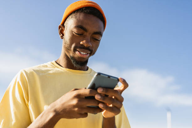 istock Young male skateboarder at skate park 1363624882