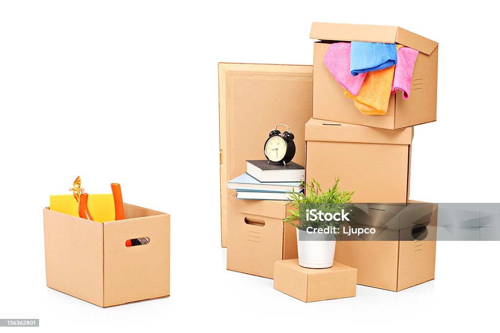 Moving boxes and other stuff Moving boxes and other moving stuff isolated on white background Activity Stock Photo