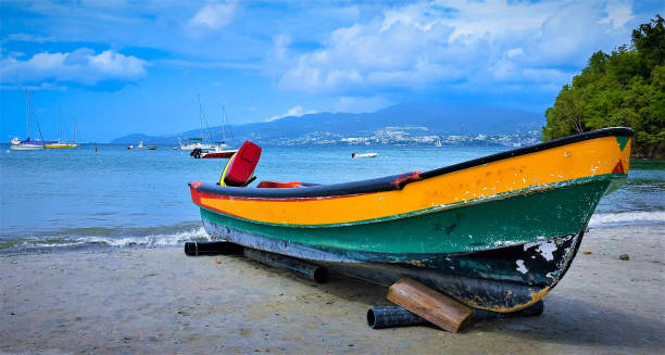 Fisherman arriving at the local pier on a fishing boat.