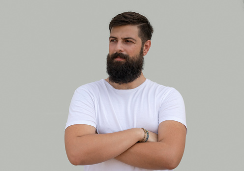 Bearded handsome man in casual clothing, Daylight portrait