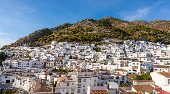 Mijas village skyline in Costa del Sol beautiful Mediterranean white village whitewashed with flower pots in Malaga of Andalusia of Spain