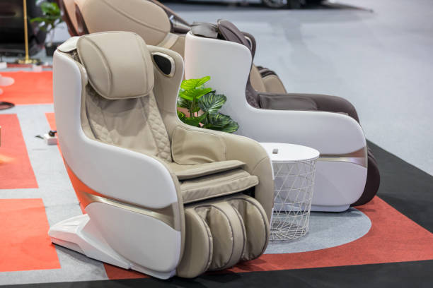 Electric Massage Chairs. health care with massage armchair. Leather reclining electric massage chair. stock photo