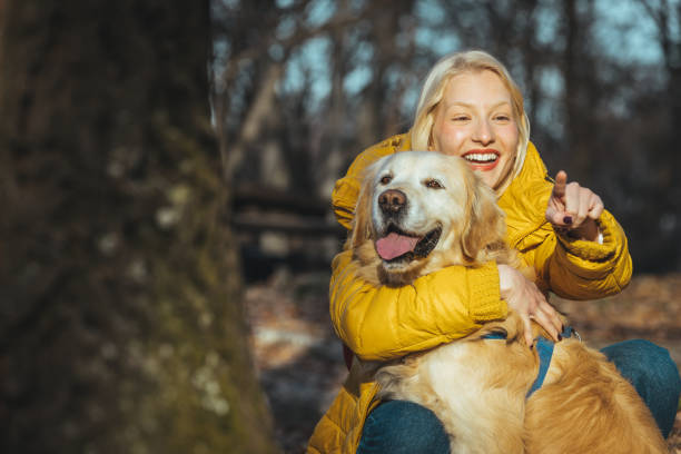 istock Young woman with dog 1363637949