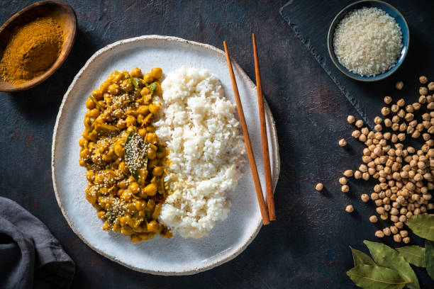 istock Spicy masala chickpea with basmati rice indian vegan plant based 1363638728