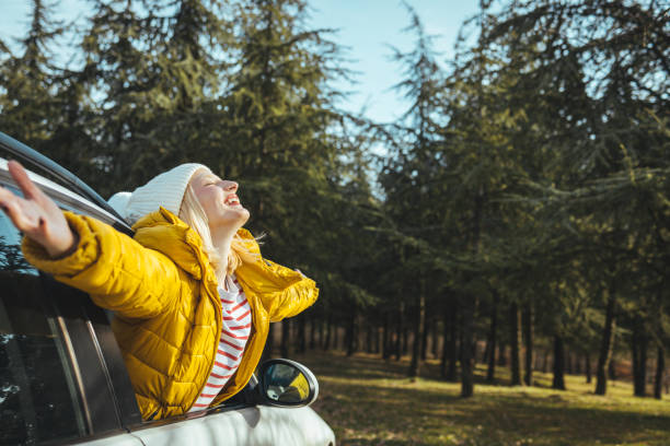 istock Young girl enjoying a road trip. 1363639749
