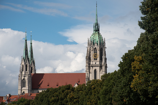 Side of the Catholic St. Paul's Church (Paulskirche) in Munich, Germany, on a sunny day.