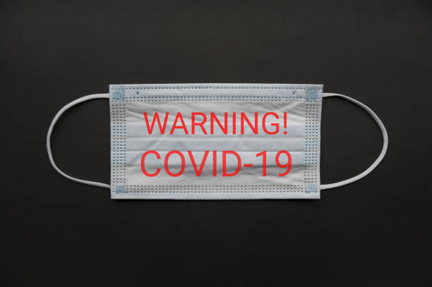istock Isolated Coronavirus or COVID-19 protective medical face mask 1363640157