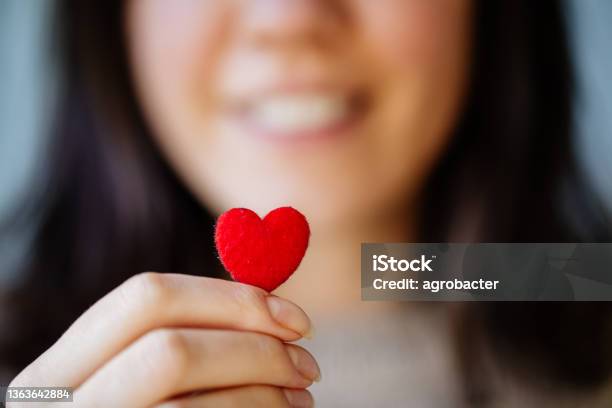 Woman Holding Tiny Heart Stock Photo - Download Image Now - Blood Donation, Organ Donation, Heart Shape