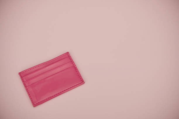 istock Empty pink wallet on pastel pink background with copy space 1363644917
