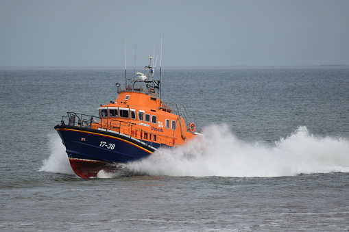 Withernsea, UK - August 20, 2017\n\nRNLI Humber Spurn lifeboat and RNLI Withernsea Inshore Rescue lifeboat practice manoeuvres in the North Sea