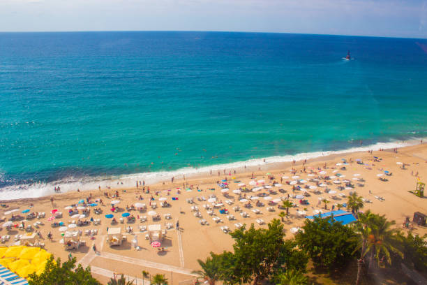 Beach in Alanya, Turkey. View and heights, top view. Blue sea in summer. Vacation in Turkey. Cleopatra beach Beach in Alanya, Turkey. View and heights, top view. Blue sea in summer. Vacation in Turkey. Cleopatra beach. alanya stock pictures, royalty-free photos & images
