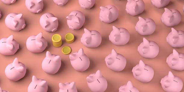 istock Many piggy banks looking at coins. Copy space. 3D illustration. 1363652924