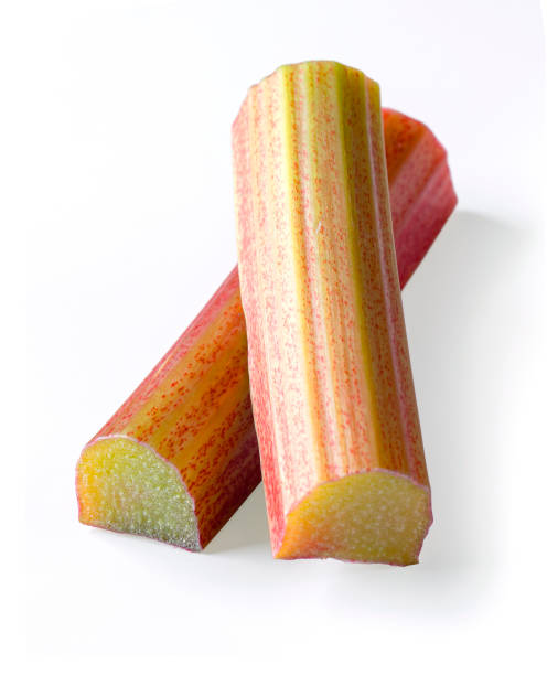 istock Cut stems of rhubarb on a white background. 1363654453