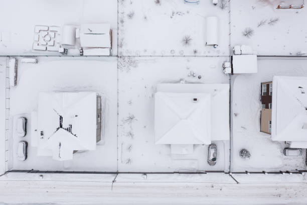 istock Top view of dacha houses roofs under snow 1363661298