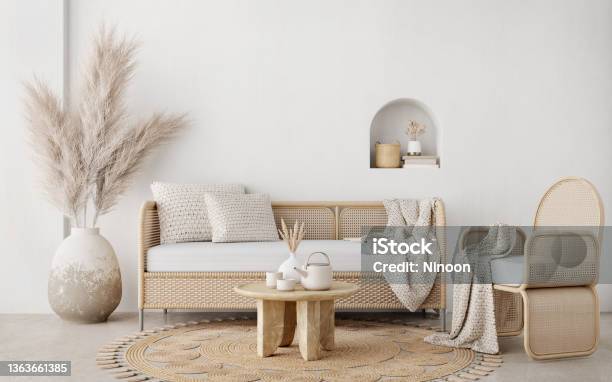 Boho Style Living Room With Wicker Chairsofatable And Pampas In The Pot On White Wall Background3d Rendering Stock Photo - Download Image Now