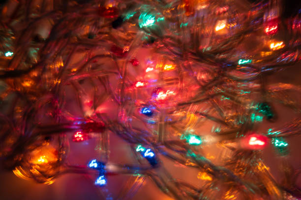 istock Colorful xmas blurred background with bright shiny lines of light 1363663592