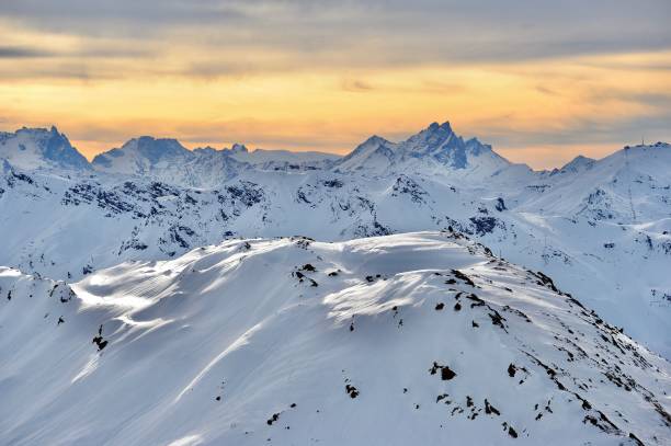 French alps in snowy day Snowy mountain by sunset time courchevel stock pictures, royalty-free photos & images