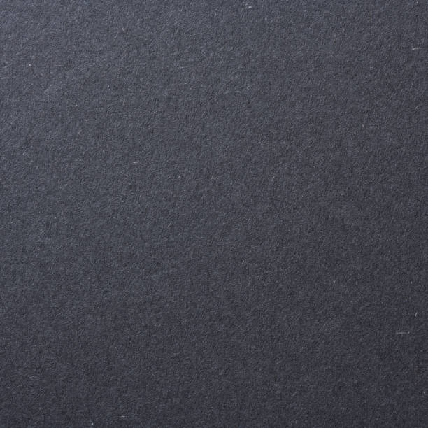 istock Black paper texture. Paper texture for use as a background 1363669824