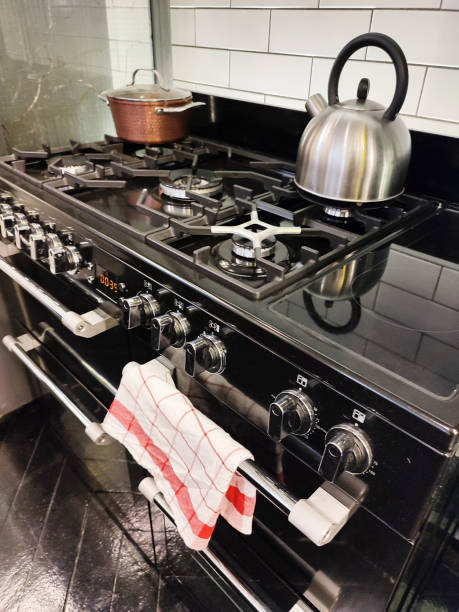 istock Cooking pan and Kettle On a Stove 1363672356
