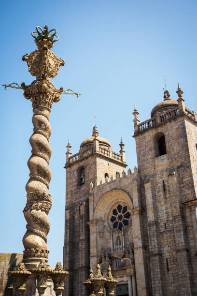 Facade and obelisk of the Se Cathedral in Porto stock photo