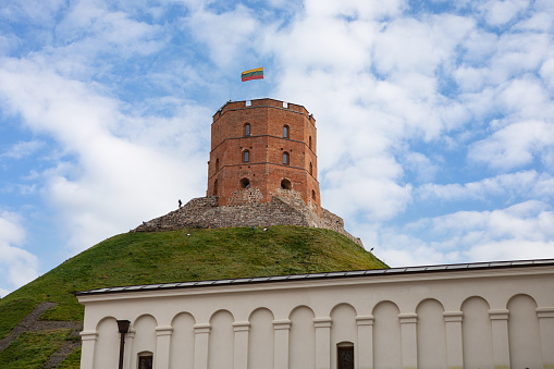 Vilnius, Lithuania - November 5, 2021: Gediminas Tower on the hill in the old town center in Vilnius, Lithuania. The tower is an important state and historic symbol of the city of Vilnius.