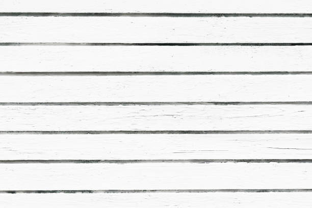 istock Peeling paint texture. White wood background. Paint desk texture. Cracked wooden wall pattern. 1363680511