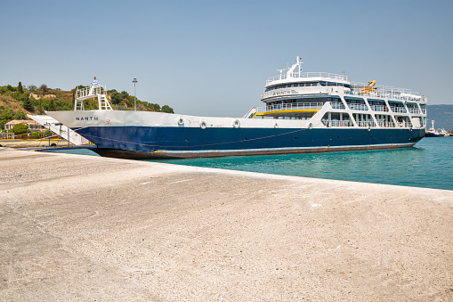Kerkyra, Corfu, Greece - August 10, 2021: Nanth ferry ship ready for loading in passenger port of Corfu.