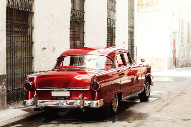 istock Shiny vintage red car parked on street 1363684963
