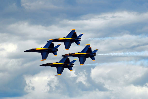 Wantagh NY USA May 23 A group of four jets streak across the sky over Wantagh New York in a diamond formation