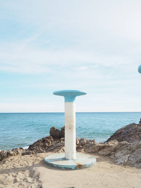 Relaxing shot a shower in the beach of Sitges Catalan Coast
