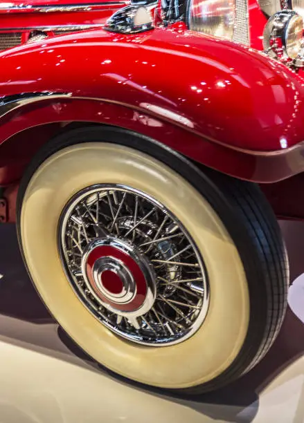 Retro big red Mercedes wheel. Wheel close up.