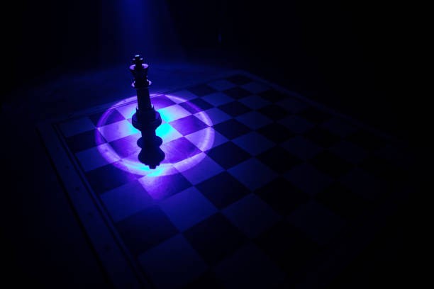 chess board game for ideas and competition and strategy, business success concept. Chess figures on dark. Selective focus