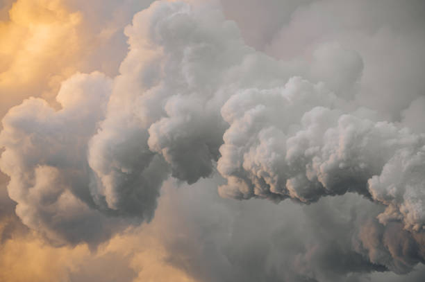 istock Thick smoke from plant chimney polluting the air 1363698503