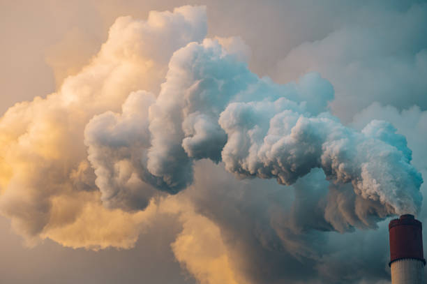 istock Thick smoke from plant chimney polluting the air 1363698510
