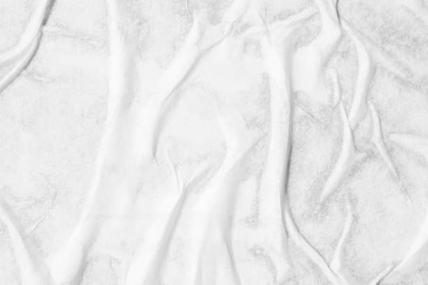 istock white crumpled and creased paper poster texture background 1363698643