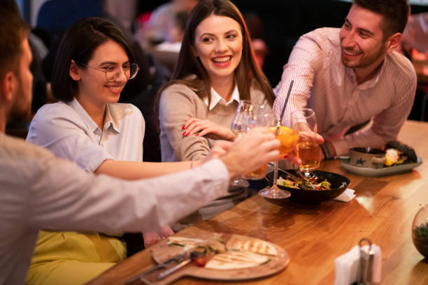 istock Friends having fun, drinking at the bar 1363698664