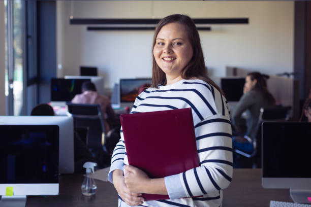 Female team leader in the office stock photo