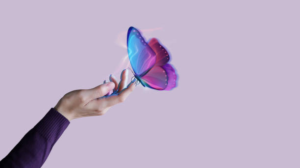 Biosensor Technology Concepts. using for New Experiences with Metaverse, Web3 and Blockchain. Hand Interacting with the Computer Graphic Surrealism Butterfly via Biosensor Tech stock photo