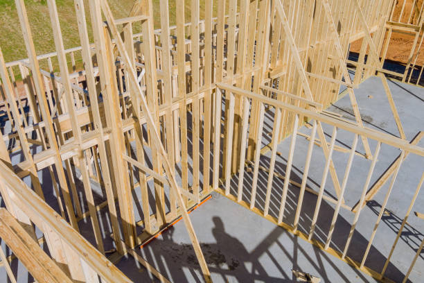 istock Aerial view the timber frame beam framework house stick built home under construction new build with wooden truss 1363710034