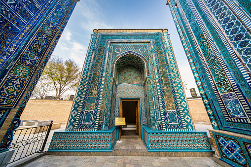 JUNE 23,2023, SAMARKAND, UZBEKISTAN: The Registan, the heart of the ancient city of Samarkand - Uzbekistan. Dramatic sunset sky, copy space for text, wide angle lens shot
