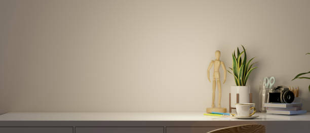 istock Close-up Minimal top table with decor and copy space over white wall 1363717485