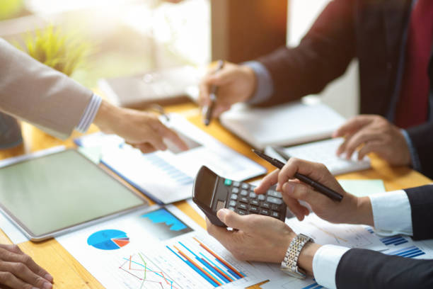 istock Cropped image of an accounting team having a meeting 1363717592