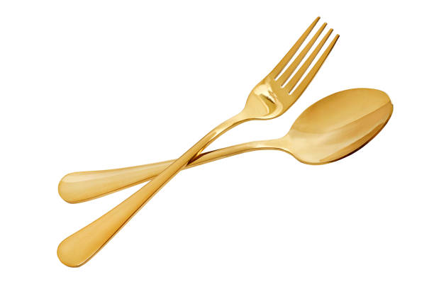 istock Gold spoon and fork isolated white background with, with clipping path 1363718465