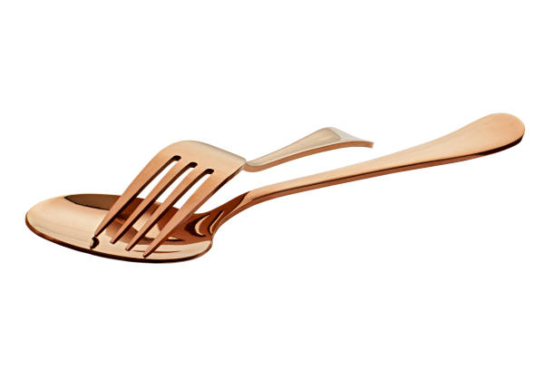 Rose gold spoon and fork isolated white background, with clipping path