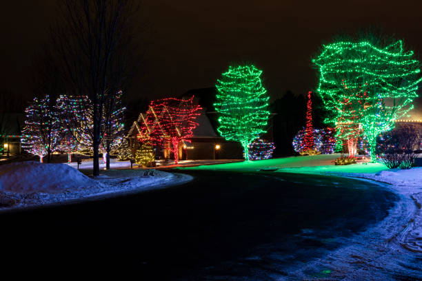 holiday lights illuminate neighborhood stock photo