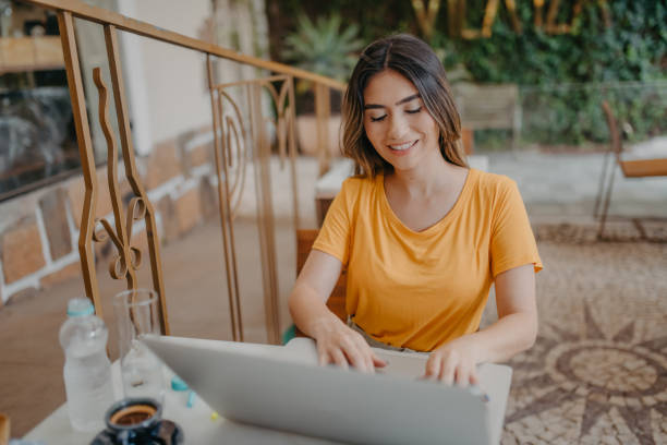 istock young woman working outside the office 1363722482