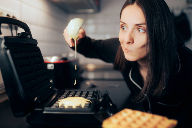 Funny hungry home cool making delicious Belgian dessert for breakfast