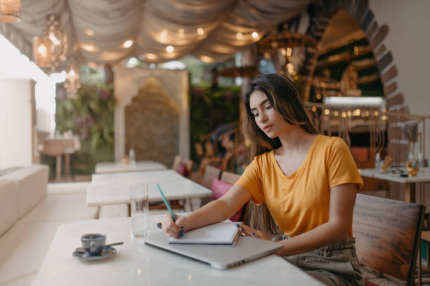 istock young woman working outside the office 1363722671