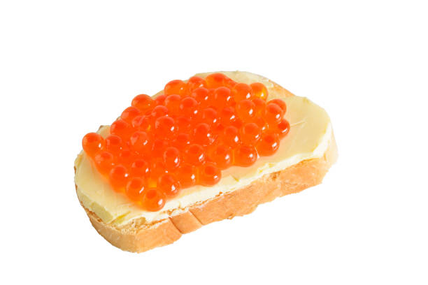 istock Sandwich with red caviar, highlighted on a white background. 1363728732
